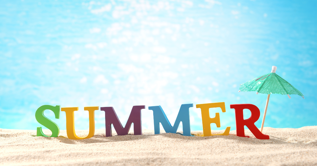 SUMMER is spelled out in colourful letters on the beach